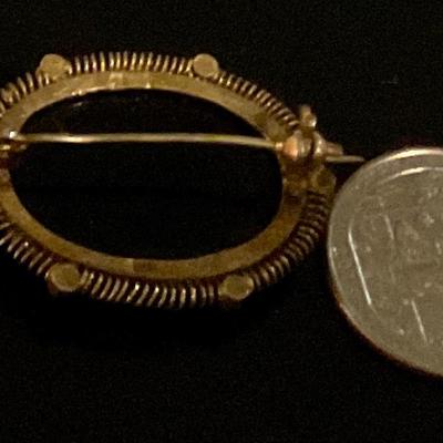 Sterling silver broach with black stone