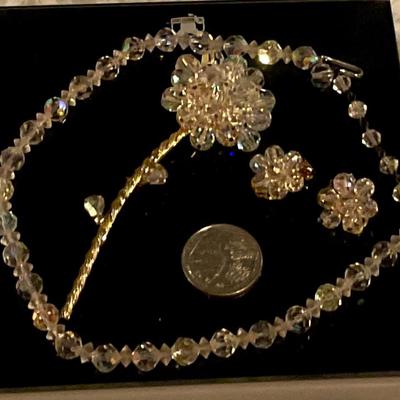 Alice Caviness, Crystal flower pin with matching clip on earrings, and necklace