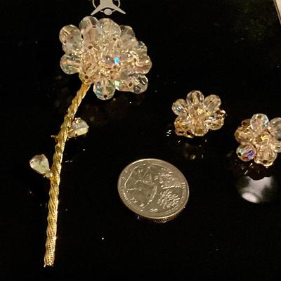 Alice Caviness, Crystal flower pin with matching clip on earrings, and necklace