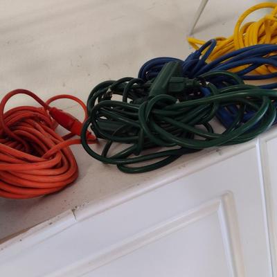 Assortment of Extension Cords and Reel