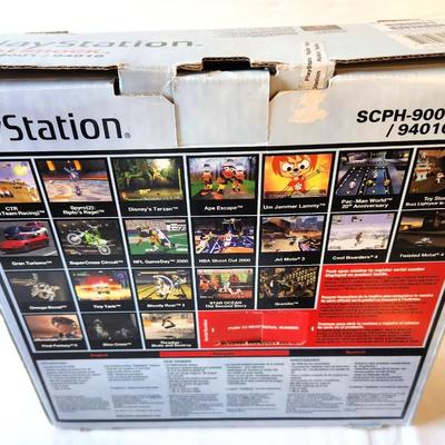 Lot #34 Sony Playstation Dual Shock w/4 games - works