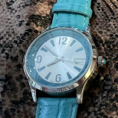 Teal watch needs a battery, large dial
