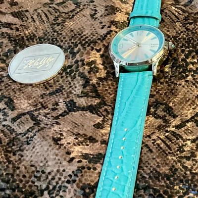 Teal watch needs a battery, large dial