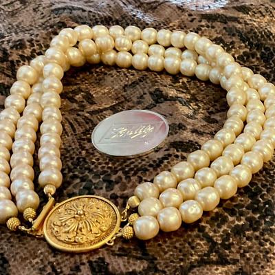 Faux pearl choker with brass medallion clasp