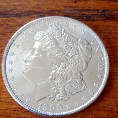 LOT 66 1900 SILVER DOLLAR