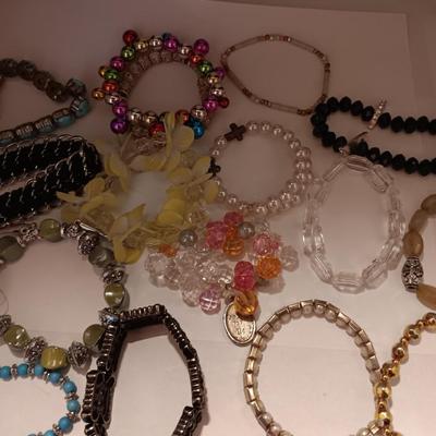 Lot of 12 Women's colorful beaded elastic bracelets