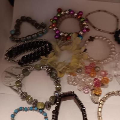 Lot of 12 Women's colorful beaded elastic bracelets