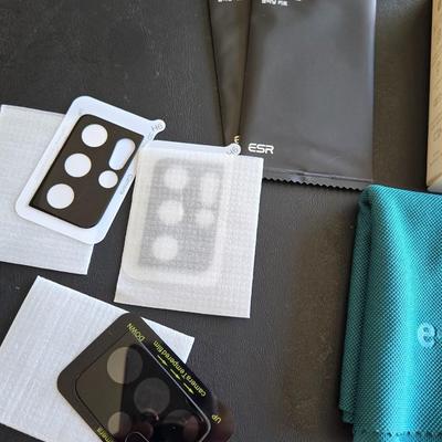Electronics Cloth, Wireless Earbuds, and Tempured Glass Phone Camera Covers