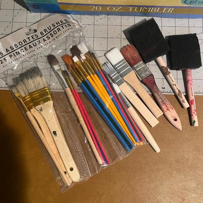 Lot Of Paint and Brushes