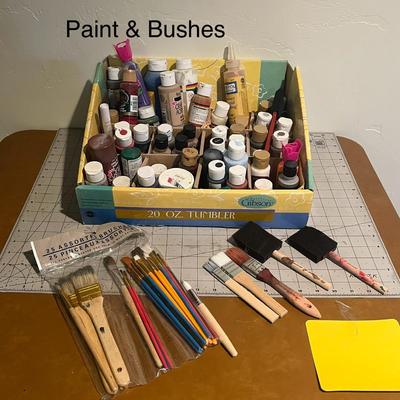 Lot Of Paint and Brushes