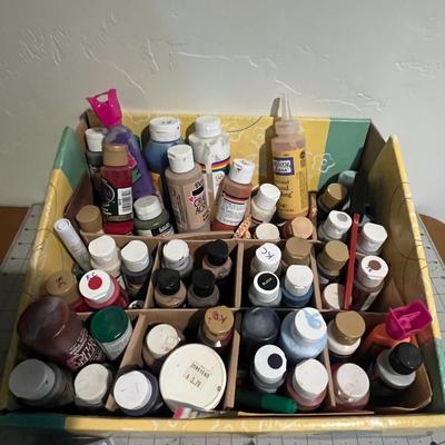 Lot Of Paint and Brushes