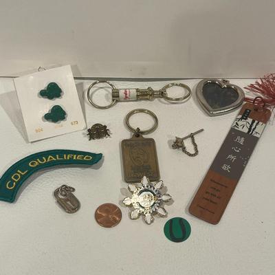 Various Pins, Buttons, Charms And Keychains