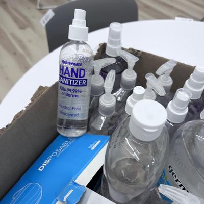 Lots of HAND SANITIZER, MASKS, and Tissues 