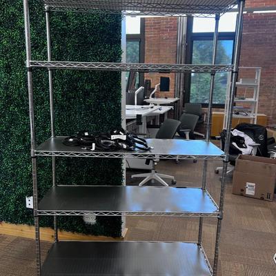 Rolling Rack (near the faux green wall) 