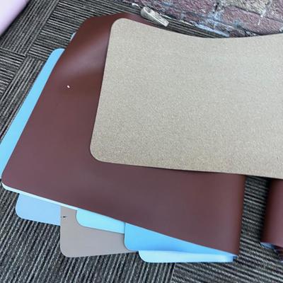 Pile of Desk Mats 