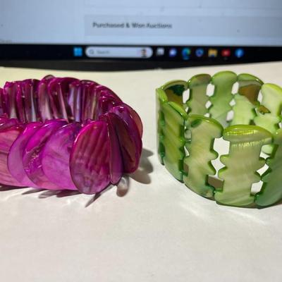 2-Vintage Shell Vivid Color Stretch Bracelets in Very Good Preowned Condition.