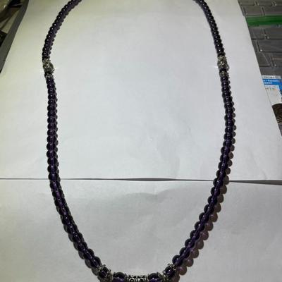 Vintage Amethyst Bead Stretch Necklace 28" Long in Very Good Preowned Condition.