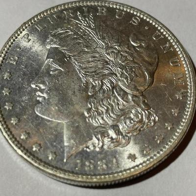 1884-P MS64 CONDITION MORGAN SILVER DOLLAR AS PICTURED.
