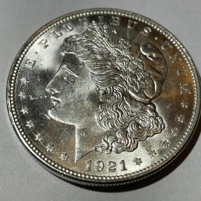 1921-P BRILLIANT UNCIRCULATED CONDITION MORGAN SILVER DOLLAR AS PICTURED.
