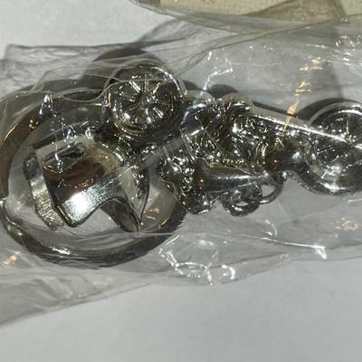 Vintage Motorcycle Fashion Jewelry Pin, Keychain, & Skull Ring Size 13.25 in Good Preowned Condition.