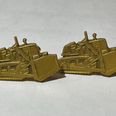Vintage Leavens Pair of Cuff Links Gold Toned Bulldozers Preowned in Good Condition.