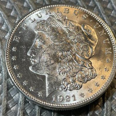 1921-P UNCIRCULATED CONDITION MORGAN SILVER DOLLAR (COIN #3) AS PICTURED.
