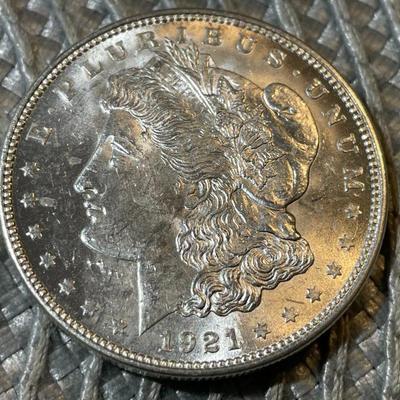 1921-P UNCIRCULATED CONDITION MORGAN SILVER DOLLAR (COIN #1) AS PICTURED.