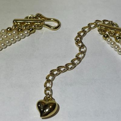 Vintage Signed Carolee Triple-Strand Graduated Lustrous Faux White Pearl w/Gold-tone Clasp Adjustable Necklace in VG Condition.