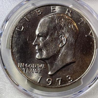 PCGS CERTIFIED 1973-P MS65 GRADED EISENHOWER DOLLAR AS PICTURED.