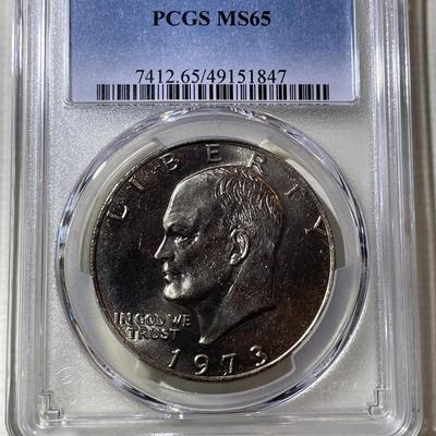 PCGS CERTIFIED 1973-P MS65 GRADED EISENHOWER DOLLAR AS PICTURED.