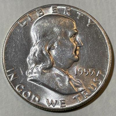 1955 **BUGS BUNNY** AU/UNCIRCULATED CONDITION FRANKLIN SILVER HALF DOLLAR AS PICTURED.
