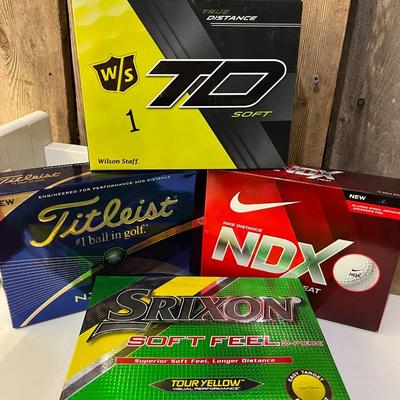 Four Packs of 12 New Golf Balls - Titleist, NDX, Srixon, TD