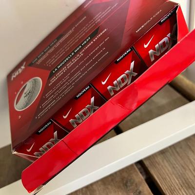 Four Packs of 12 New Golf Balls - Titleist, NDX, Srixon, TD