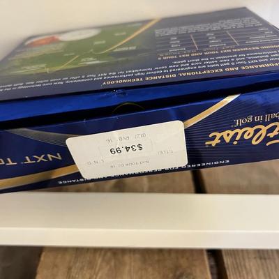 Four Packs of 12 New Golf Balls - Titleist, NDX, Srixon, TD