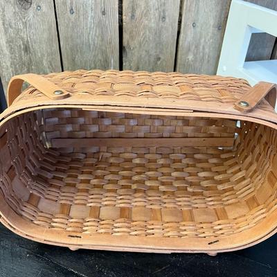 Two Mid Century Handwoven Rattan Handled Baskets