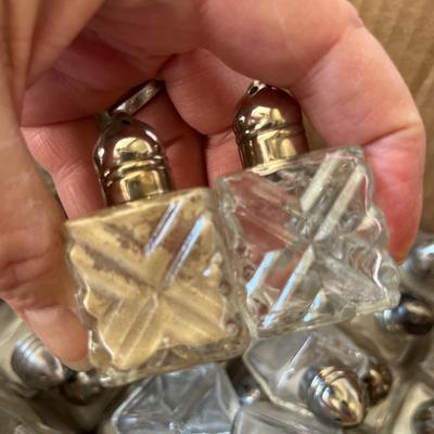 Lots of small salt and pepper shakers