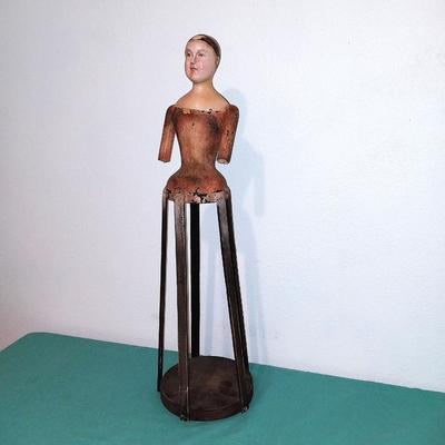 CAGE DOLL