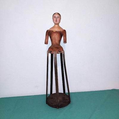 CAGE DOLL