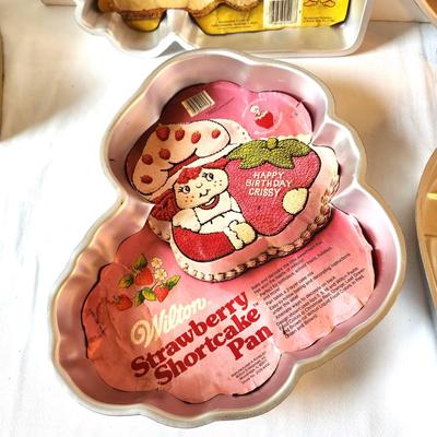 Lot #50 Lot of 4 Vintage Wilton Character Cake Pans - Strawberry Shortcake, more