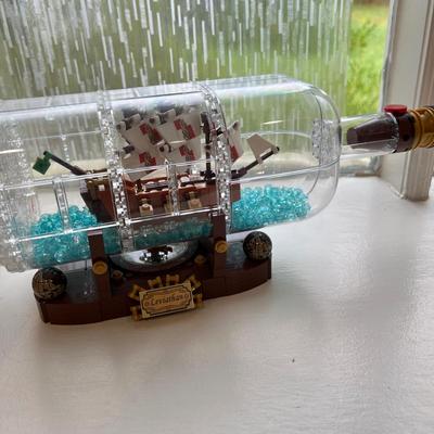4 New in Box Retired Highly Collectible Legos Sets + 1 Put Together Ship Bottle