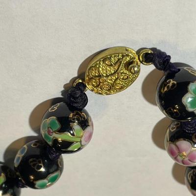 Vintage Asian Black Bead 24" Cloisonne Necklace Knotted with Mixed Color Flowers in VG Preowned Condition.