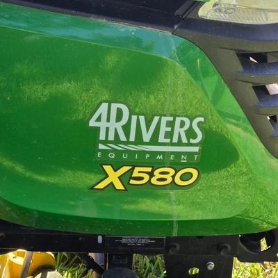JOHN DEERE 4 Rivers X 580 with 54" Accel Deep Deck with John Deere Tiller, John Deere Snow Blower, and Yardworks Lawn Sweeper