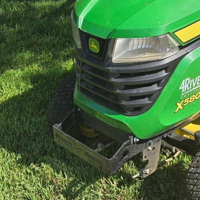 JOHN DEERE 4 Rivers X 580 with 54" Accel Deep Deck with John Deere Tiller, John Deere Snow Blower, and Yardworks Lawn Sweeper