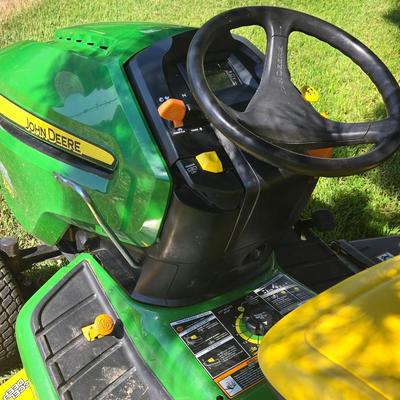 JOHN DEERE 4 Rivers X 580 with 54" Accel Deep Deck with John Deere Tiller, John Deere Snow Blower, and Yardworks Lawn Sweeper