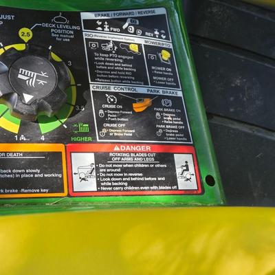 JOHN DEERE 4 Rivers X 580 with 54" Accel Deep Deck with John Deere Tiller, John Deere Snow Blower, and Yardworks Lawn Sweeper