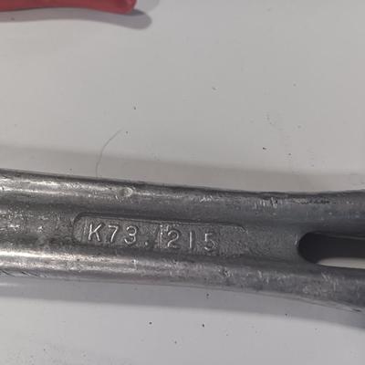 Assortment of piers - Rigid pipe wrench - tape measure and small level