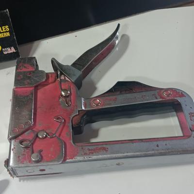 Leather punch = Staplers - and a hand saw