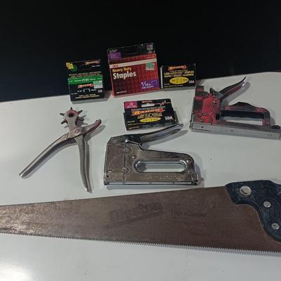Leather punch = Staplers - and a hand saw
