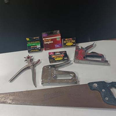 Leather punch = Staplers - and a hand saw