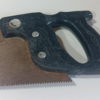 Leather punch = Staplers - and a hand saw